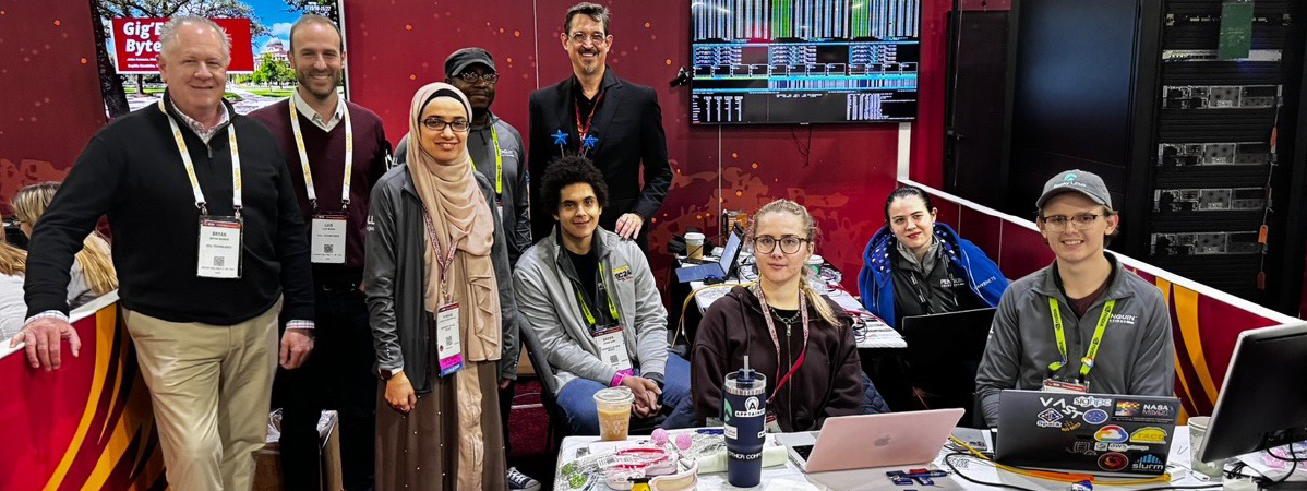 Photo: . From left: Dell representatives Bryan Bianchi (Data Center Account Executive, AI Select) and Luis Marin (Global Account Manager, AI Select), UNM Roadrunner Team: Sumaya Houssini Mohamed (CS), Maurice Ransby, Matthew Fricke (faculty mentor), Saskia Trefethen (CS), Molly Palko (CS) and Ryan Scherbarth (CS, team lead).